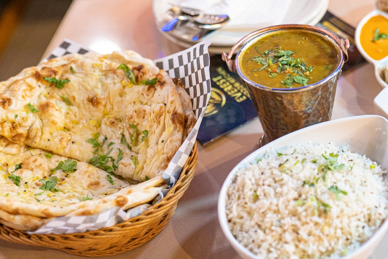 why-choose-us Savor authentic Indian cuisine with naan and rice, perfect for lunch or dinner.